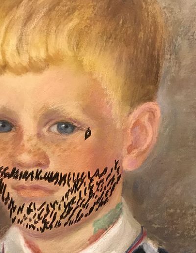 Painting of a young boy with a bead drawn on at Jack Brown's Kill Devil Hills, NC.